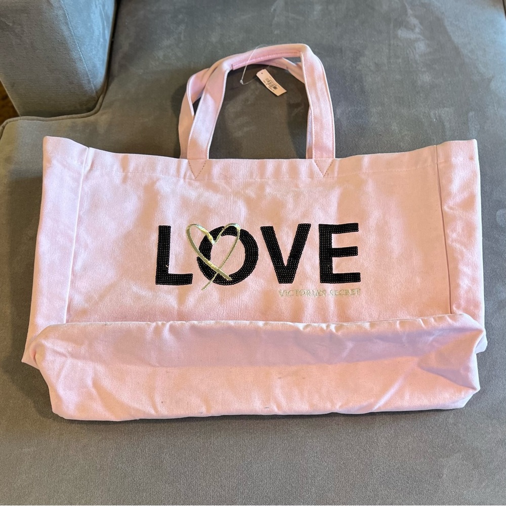Victoria’s Secret Tote Bag NWT. Pink canvas black sequin “LOVE”.